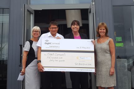 iSightCornwall CEO, Terri Rosnau-Ward received a cheque from staff at the Beresford Hotel in Newquay