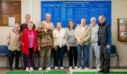 The members of Bugle Blues bowling club pose for the camera.