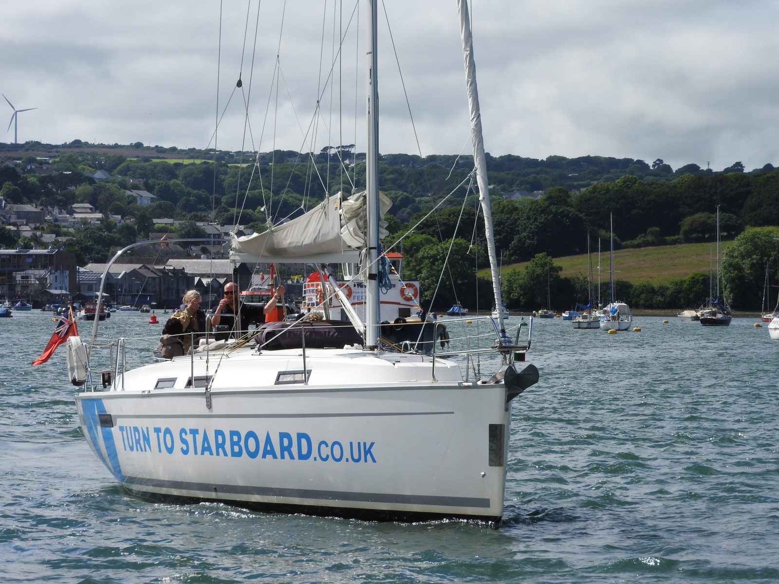 A Turn to Starboard branded boat sailing in the British sea.