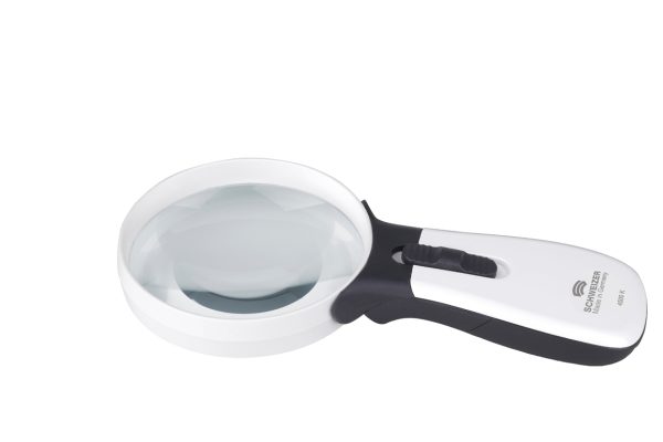 A round headed magnifier with a comfortable handle with a switch in the middle to turn on the light