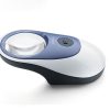A rounded magnifier shaped similarly to a computer mouse with a round button in the middle