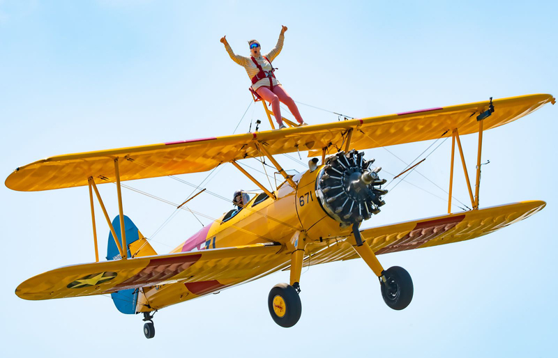 A fundraiser taking part in a wing walk