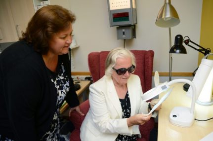 Lynda Thomas, Low Vision Coordinator at iSightCornwall performs a low vision assessment with one of our clients.