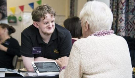 iSightCornwall staff member Dominic Hall with a client at the recent Penzance drop-in event