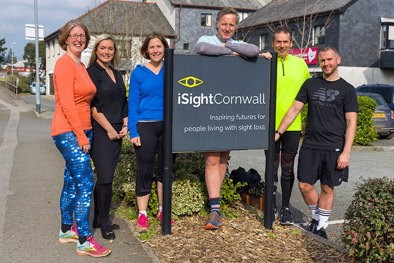 The six iSightCornwall London Marathon 2018 runners pictured in front of the iSightCornwall sign outside of the Sight Centre in Truro.