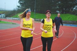 iSightCornwall's marathon running team Claire and Rachel running on a track