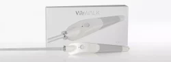The box of a WeWALK cane showcasing the handle which is large than a traditional white cane and has a touchpad button