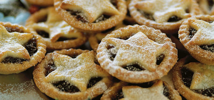 Mince pies stacked on top of each other.